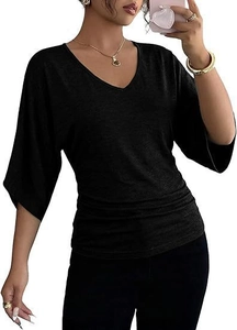 Detail of V-neck black top featuring elegant flared sleeves and waist ruching design