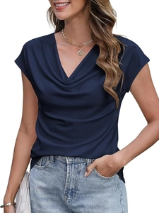 Close-up of navy blue short sleeve top featuring elegant cowl neck and ribbed fabric texture