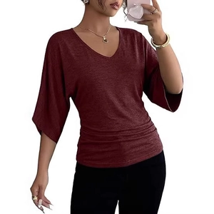 Women's V-neck dark red top with batwing sleeves and side shirring details