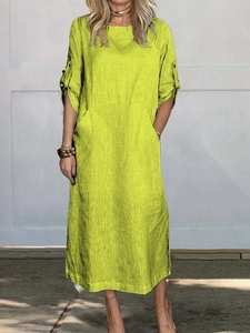Bright lime green cotton linen midi dress with short sleeves and functional side pockets