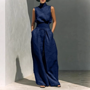 Navy blue sleeveless high-neck cotton linen wide leg jumpsuit with elegant pleated design