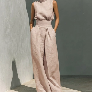 Women's two-piece linen set with sleeveless crop top and high-waisted wide-leg trousers