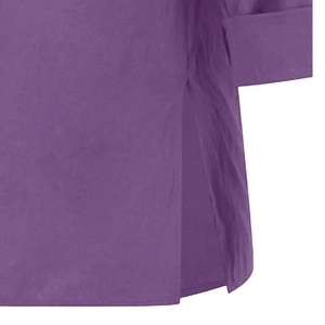 Detail view of purple cotton linen top showing side slit design and folded sleeve cuffs