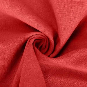 Close-up of red linen fabric texture showing natural weave and soft drape details