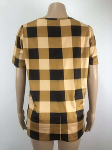 Detailed back view of buffalo plaid short sleeve T-shirt on a headless mannequin