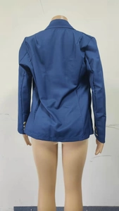 Back view of a tailored navy blue blazer showing slim fit stitching and premium texture