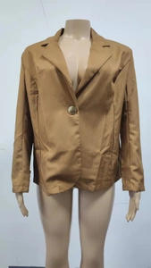 Detail view of khaki women's casual blazer showing notched lapel and single-button closure