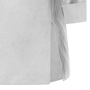 Detail of side split and rolled cuff on a white cotton linen V-neck tunic top