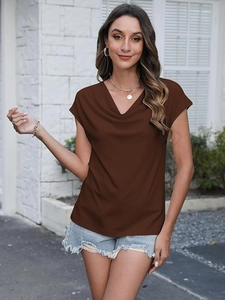 Detail view of coffee brown short sleeve top featuring a chic draped V-neckline texture
