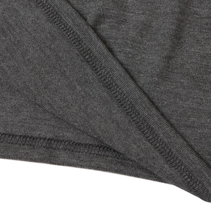 Macro shot of dark grey knit fabric featuring high-quality double-stitched seam details
