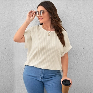 Cream white oversized ribbed knit T-shirt with batwing sleeves and rolled cuffs
