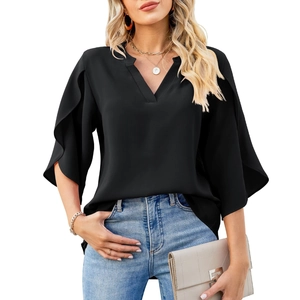 Detail of elegant black V-neck chiffon blouse with layered ruffle cuffs and petal sleeves