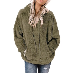 Macro shot of fluffy lamb wool texture and adjustable drawstring on olive green hoodie