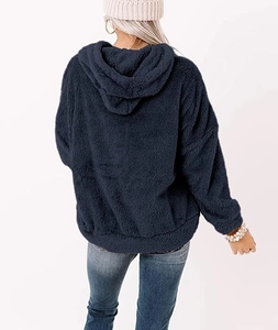 Detailed back view of deep blue hooded teddy fleece sweatshirt with ribbed hem