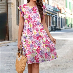 Floral print summer tiered dress featuring flutter sleeves and layered ruffled skirt detail