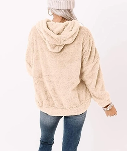 Back view of beige lamb wool hoodie featuring plush texture and soft ribbed cuffs