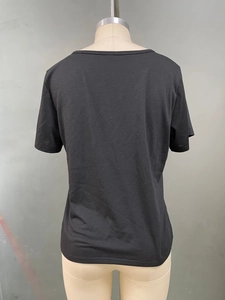 Back view of classic black short sleeve T-shirt with a slim fit and crew neck design