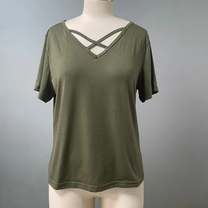 Detail of army green olive t-shirt with a stylish criss-cross lace-up V-neckline