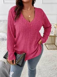 Detail of V-neck long sleeve top in ribbed knit fabric with relaxed fit for women
