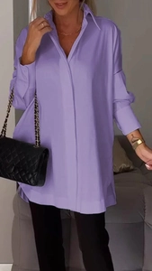Detail view of the elegant purple long-sleeve blouse featuring a lapel collar and loose fit