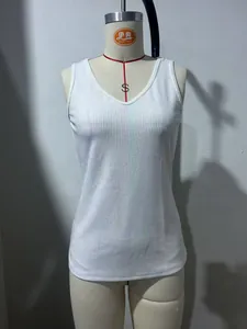 Detailed view of white V-neck ribbed knit tank top showing vertical ribbed fabric texture