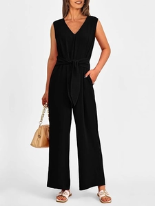 Elegant black V-neck sleeveless jumpsuit with waist tie and wide-leg trousers styling