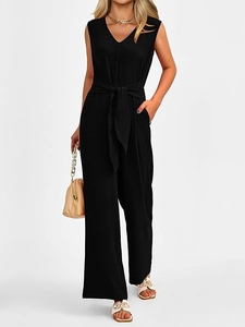 Close-up of elegant V-neck sleeveless jumpsuit with tie-waist and wide-leg trousers