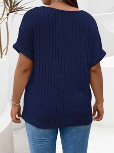 Rear view of navy blue ribbed knit short sleeve top for women with loose casual fit