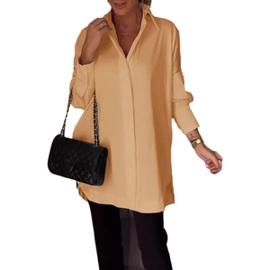 Elegant apricot oversized long sleeve blouse with classic lapel and button closure