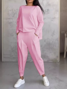 Completo casual rosa da donna in due pezzi con maglia a maniche lunghe e pantaloni jogger