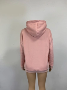 Back view of a pink oversized hoodie featuring dropped shoulders and ribbed hem details