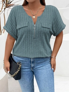 Detail of V-neck zip design and ribbed texture on the misty blue short sleeve knit top