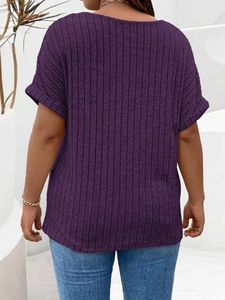 Back view of a loose dark purple knit top for women with soft ribbed texture fabric