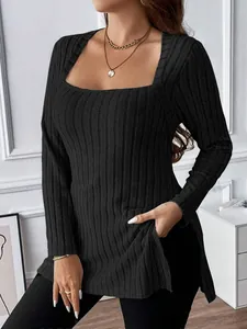 Detail of square neck black ribbed knit top with side slit and soft brushed texture