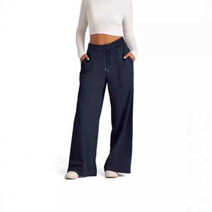 Pantalon large bleu foncé pour femme avec cordon de serrage et couture centrale décorative
