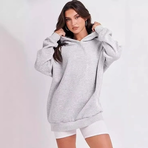 Loose fit light grey hooded sweatshirt for women with long sleeves and drawstring hood