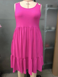 Detail view of the layered tier design on this plus size sleeveless rose red dress