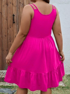 Detail showing the double straps and ruffled hem of the plus-size rose red sleeveless dress