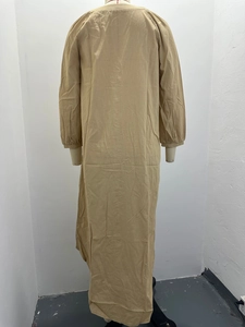 Back view of a khaki long-sleeve cotton linen dress with relaxed H-line silhouette