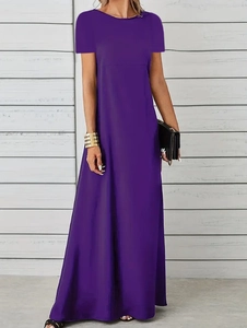 Detail of elegant purple maxi dress showing smooth crew neck and premium fabric texture