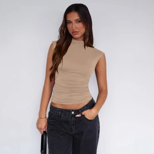 Slim fit khaki sleeveless turtleneck top with side ruching details for a casual look