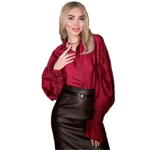 Elegant wine red satin lantern sleeve shirt paired with a brown faux leather midi skirt