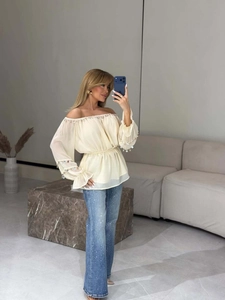 Chic off-the-shoulder chiffon blouse with beaded fringe and sequin flare jeans outfit