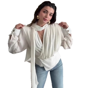 Elegant white pleated long sleeve shirt for women featuring a stylish neck tie ribbon