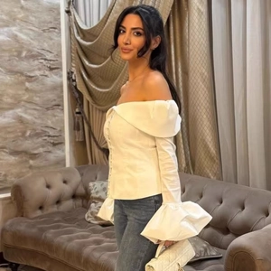 Elegant white off-shoulder long sleeve shirt with flare cuffs and slim waist design