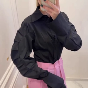 Women's black long sleeve lapel shirt with stylish pleated puff sleeves for office wear