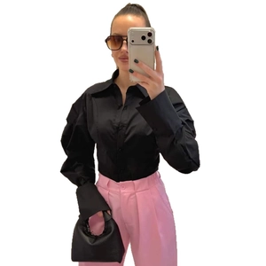 Women's black slim fit long sleeve shirt with pleated puff sleeves and lapel collar