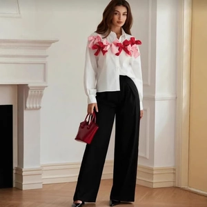 French style white long sleeve shirt with red 3D fabric bows and black wide leg pants