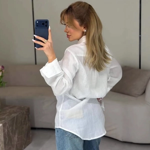 Women's casual white linen shirt with classic collar and relaxed fit long sleeves