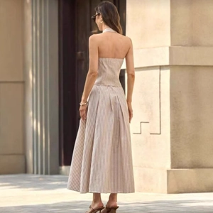 Women's chic beige striped halter top and pleated maxi skirt two-piece outfit set